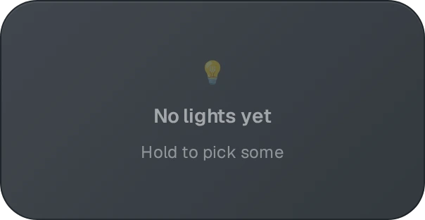 The tile in its empty state: a bulb glyph with the heading no lights yet and the hint hold to pick some.