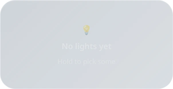 The tile in its empty state: a bulb glyph with the heading no lights yet and the hint hold to pick some.