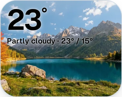 The weather widget: 23 degrees, partly cloudy